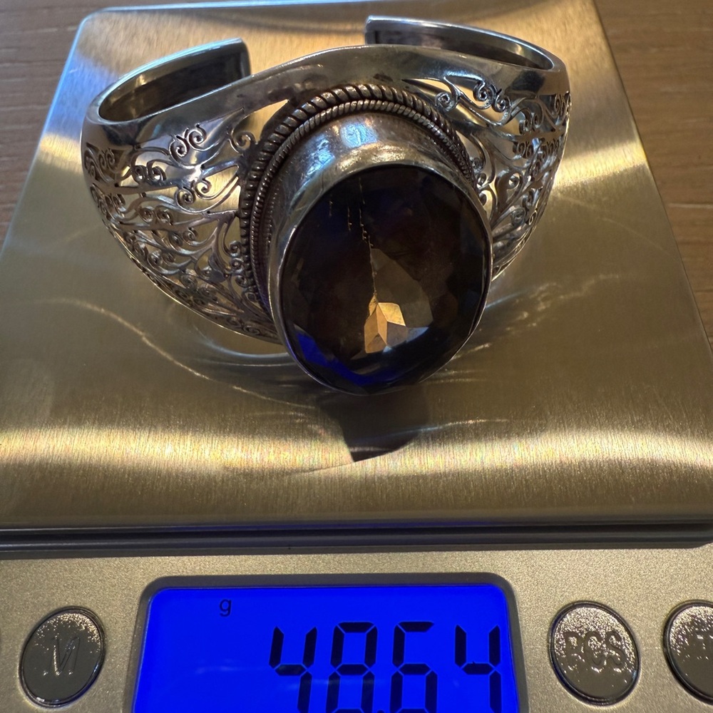Sterling Silver Cuff Bracelet with gorgeous Topaz Stone, price is firm
